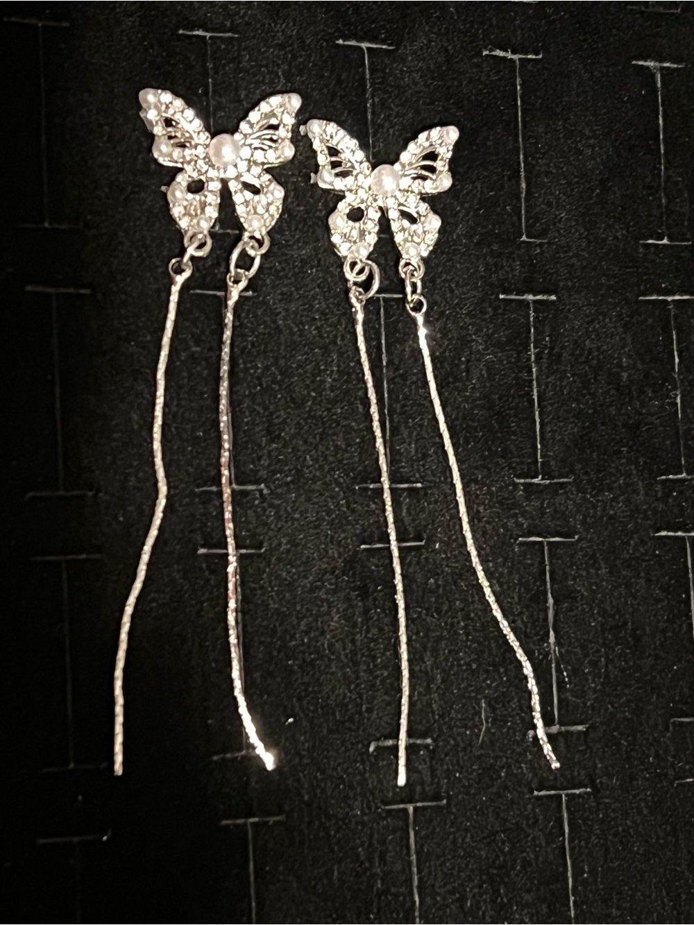 Silver toned Butterfly Drop Earrings with CZ Pearl accents